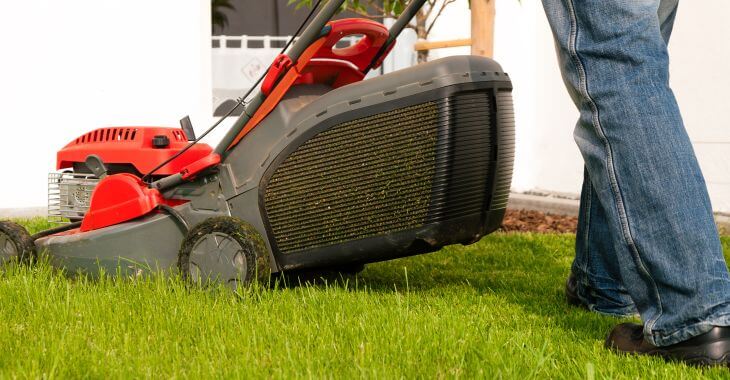 A man mowing the lawn.