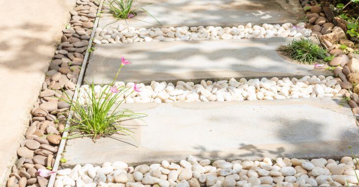 Path made of white and natural color river stones.