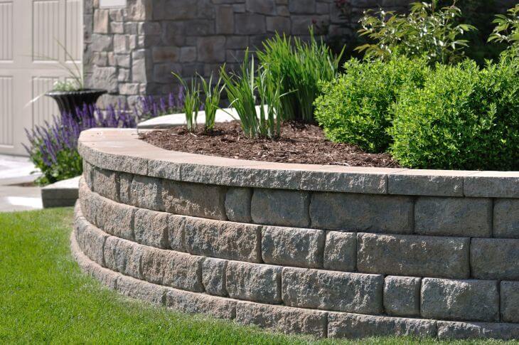 A retaining wall made from natural stone.