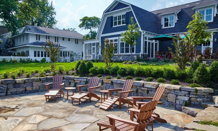 A garden patio with retaining walls preventing the soil from slipping down